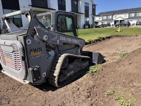 Custom-wrapped Bobcat T66 working on a residential dirt excavation project for On Point Excavation

