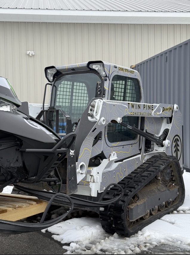 bobcat wrap with matching snowmobile